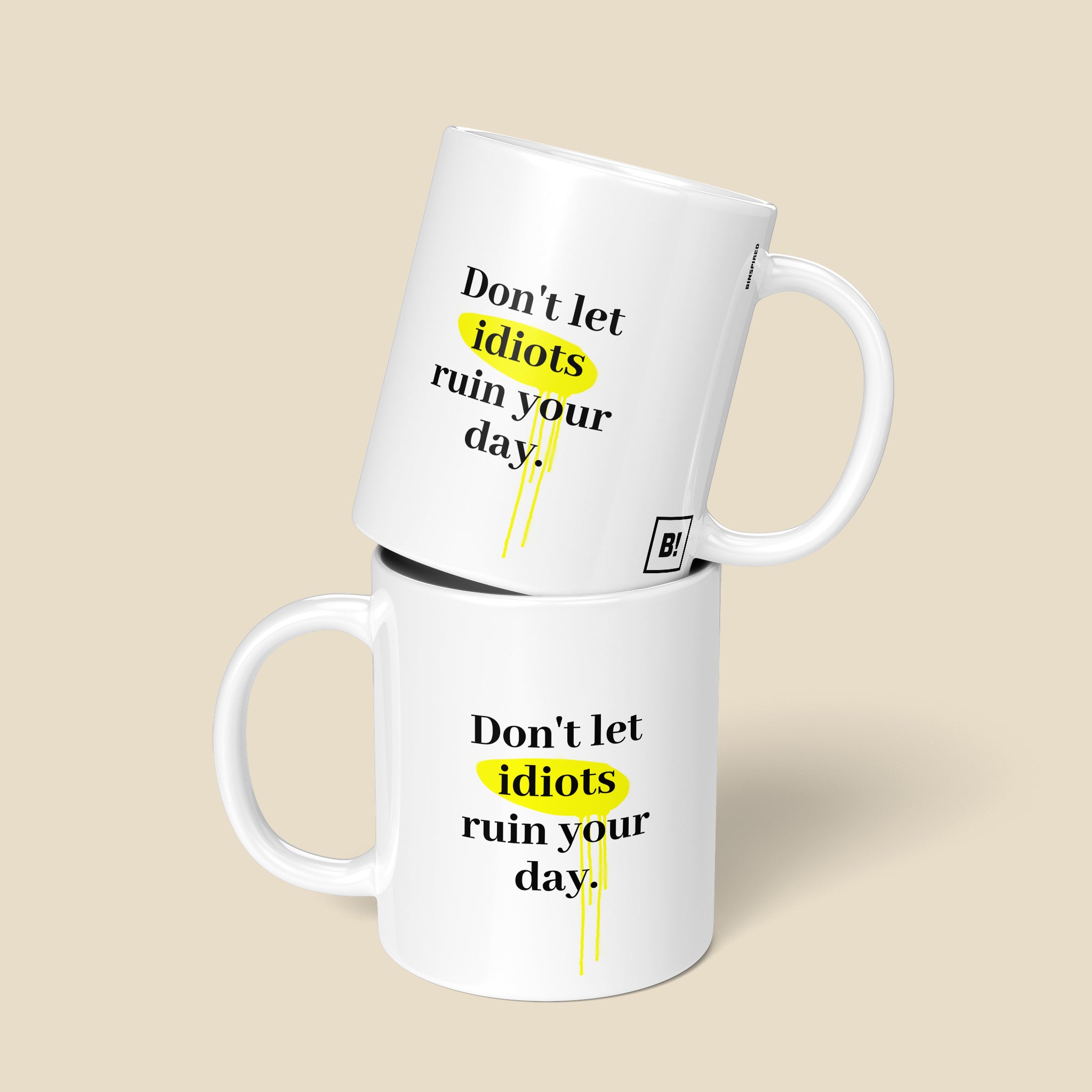 Get inspired by the quote, "Don't let idiots ruin your day" on this 11oz white glossy coffee mug with a front and back view.