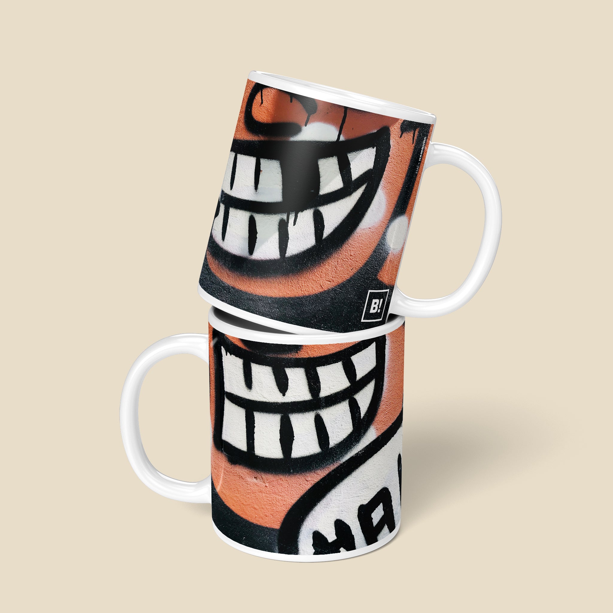 Be inspired by our Urban Art Coffee Mug "HA!" from Hamburg. This mug features an 11oz size with a front and back view.