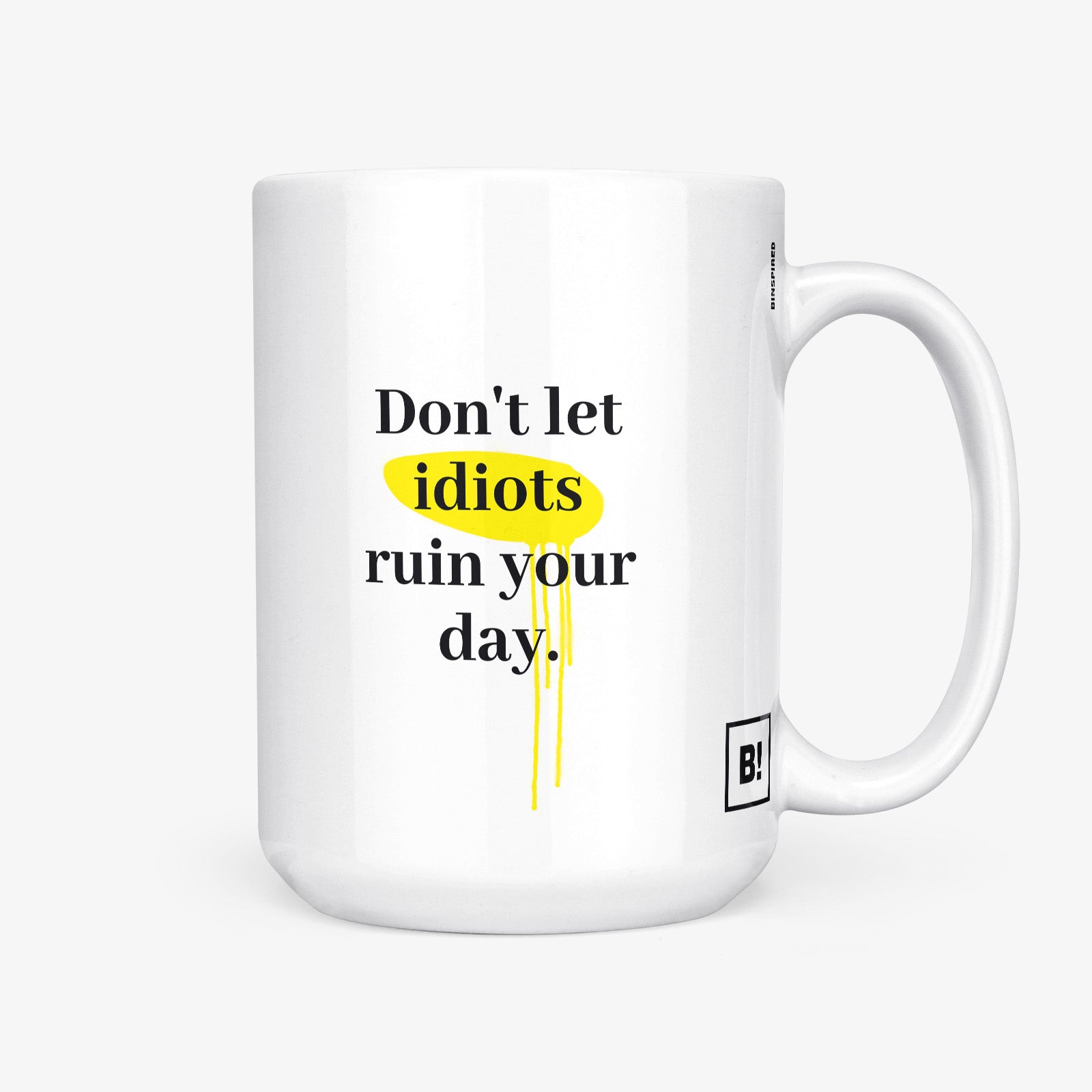 Get inspired by the quote, "Don't let idiots ruin your day" on this 15oz white glossy coffee mug with the handle on the right.