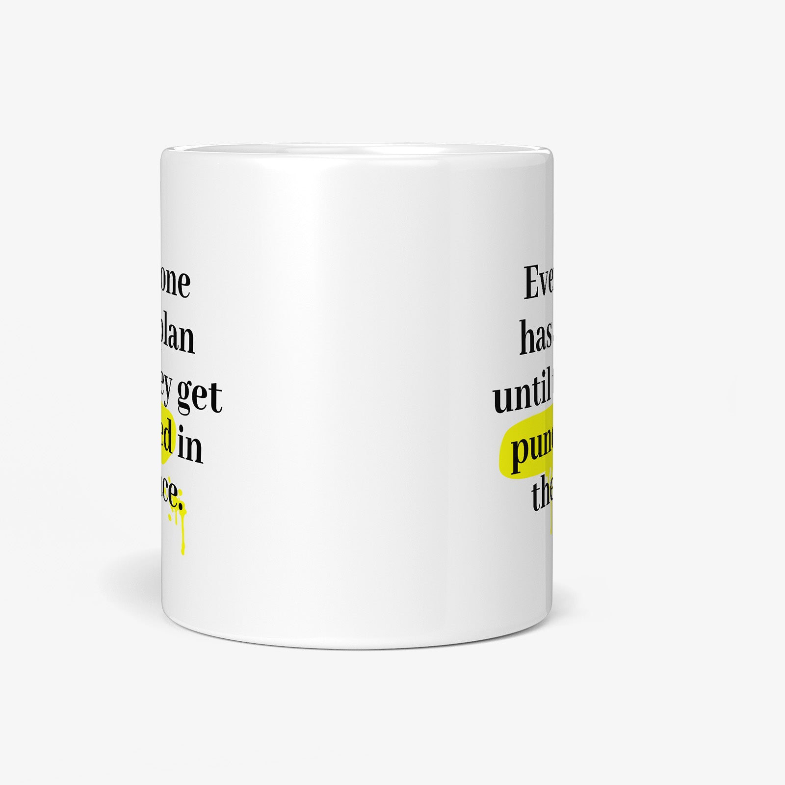 Be inspired by Mike Tyson's famous quote, "Everyone has a plan until they get punched in the face" on this white and glossy 11oz coffee mug with a front view.