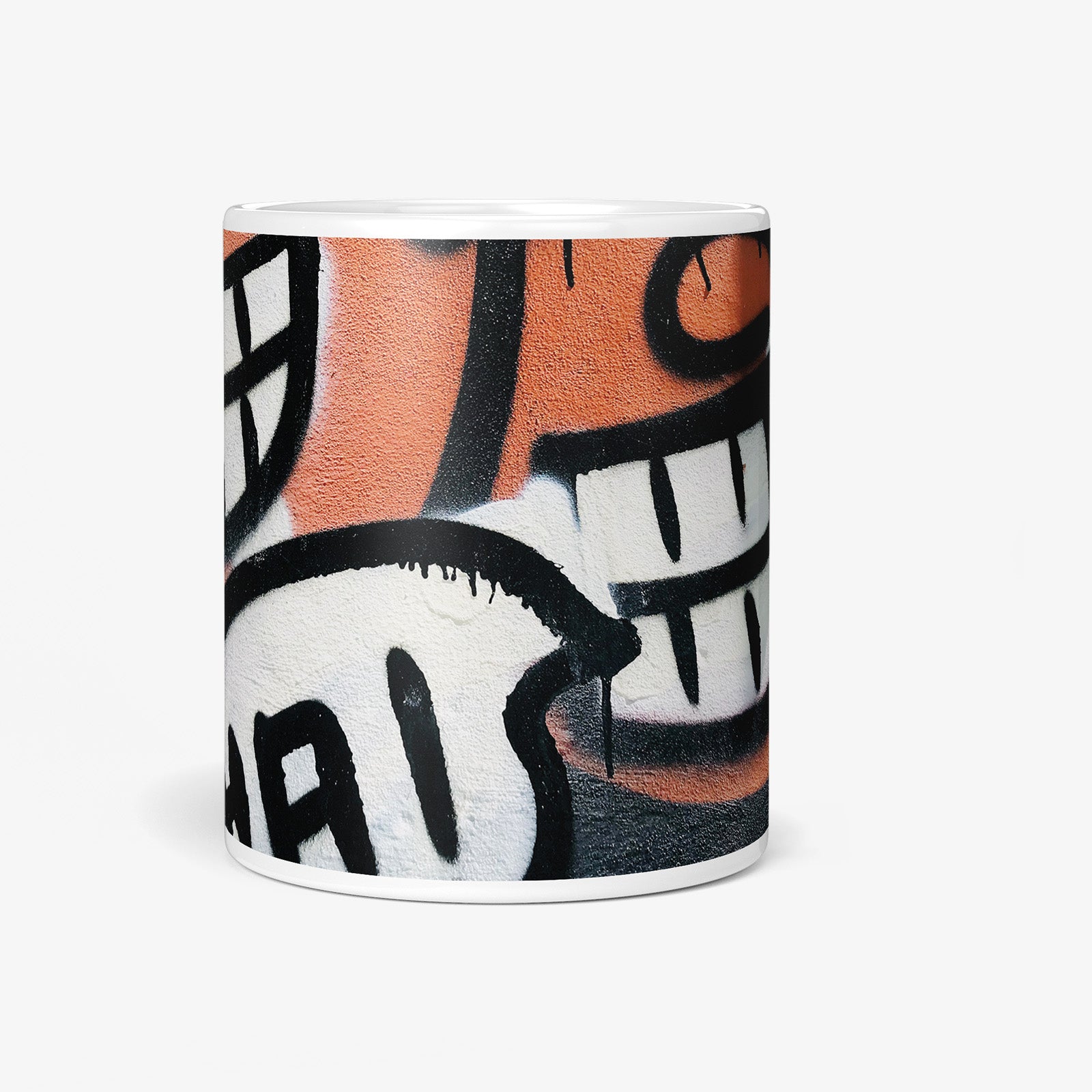 Be inspired by our Urban Art Coffee Mug "HA!" from Hamburg. This mug features an 11oz size with a front view.