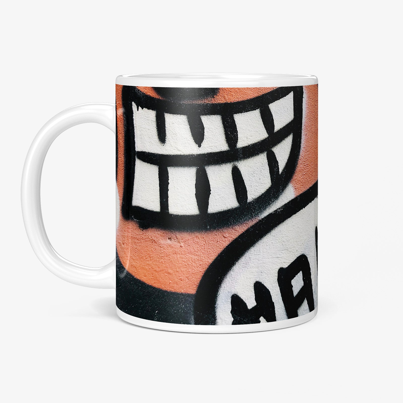Be inspired by our Urban Art Coffee Mug "HA!" from Hamburg. This mug features an 11oz size with the handle on the left.