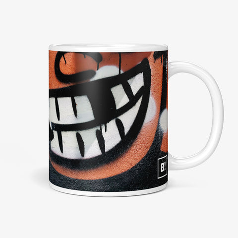 Be inspired by our Urban Art Coffee Mug "HA!" from Hamburg. This mug features an 11oz size with the handle on the right.