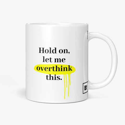Get inspired by the quote, "Hold on, let me overthink this" on this 11oz white glossy coffee mug with the handle on the right.