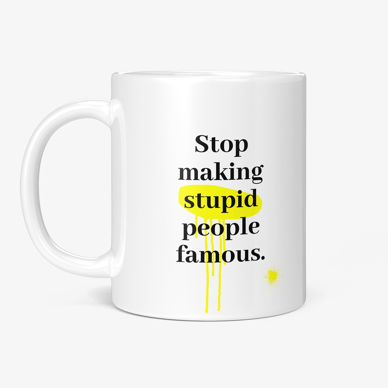 Get inspired by the quote, "Stop Making Stupid People Famous" on this 11oz white glossy coffee mug with the handle on the left.
